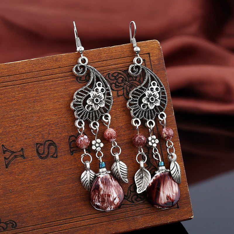 Wholesale retro hollow carved leaves tassel earrings